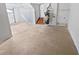 Spacious unfinished basement with concrete flooring, offering potential for customization at 5723 Antelope Trl, Atlanta, GA 30349