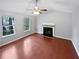 Spacious living room with hardwood floors and a fireplace at 5723 Antelope Trl, Atlanta, GA 30349