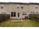 Backyard featuring a small patio and a privacy fence at 3513 Lakeview Crk, Lithonia, GA 30038