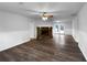 Bright living room featuring a stone fireplace and hardwood floors at 118 Mann Blvd, Stockbridge, GA 30281