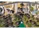 Overhead view of houses with lawns and docks, providing private lake access to residents at 6219 Woodlake Dr, Buford, GA 30518