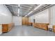 Large commercial space featuring wood trim and an open ceiling at 6219 Woodlake Dr, Buford, GA 30518