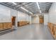 Large commercial space featuring wood trim and an open ceiling at 6219 Woodlake Dr, Buford, GA 30518