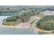 Panoramic view of a lake and boat launch showcasing the boating and outdoor activities available at 6219 Woodlake Dr, Buford, GA 30518