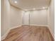 This open room features recessed lights and beautiful hardwood floors at 6219 Woodlake Dr, Buford, GA 30518