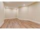 This open room features recessed lights and beautiful hardwood floors at 6219 Woodlake Dr, Buford, GA 30518
