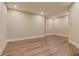 Spacious room featuring recessed lighting and hardwood floors at 6219 Woodlake Dr, Buford, GA 30518