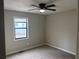 Bright bedroom featuring neutral walls and a ceiling fan at 46 Leland Sw Dr, Mableton, GA 30126