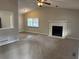 Spacious living room featuring a fireplace and vaulted ceiling at 46 Leland Sw Dr, Mableton, GA 30126