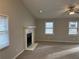 Living room featuring a fireplace and window view at 46 Leland Sw Dr, Mableton, GA 30126
