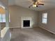Bright living room with a fireplace and ceiling fan at 46 Leland Sw Dr, Mableton, GA 30126