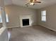 Living room with fireplace, neutral walls, and carpet at 46 Leland Sw Dr, Mableton, GA 30126