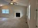 Living room with fireplace and ceiling fan at 46 Leland Sw Dr, Mableton, GA 30126