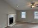 Living room with fireplace, neutral walls, and carpet at 46 Leland Sw Dr, Mableton, GA 30126