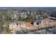 Aerial view showcasing the neighborhood, nearby properties, landscaping, and road access at 225 River Valley Lot 5 Ct, Atlanta, GA 30328