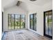 Bright living area featuring large windows and a vaulted ceiling at 225 River Valley Lot 5 Ct, Atlanta, GA 30328
