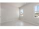 Bright bedroom featuring two windows offering natural light at 88 Black Gum Ln # 43, Auburn, GA 30011