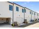 Row of new construction townhomes with garages and modern design at 88 Black Gum Ln # 43, Auburn, GA 30011