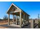 Picturesque community picnic gazebo with seating and modern table in the garden at 88 Black Gum Ln # 43, Auburn, GA 30011