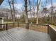 A spacious back deck with wood railings, offering a great space for outdoor enjoyment at 130 Ashley Oaks Dr, Mcdonough, GA 30253
