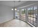Bright breakfast nook featuring large windows with views of the surrounding greenery at 130 Ashley Oaks Dr, Mcdonough, GA 30253