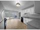 Well-lit kitchen with white cabinetry and modern appliances, perfect for cooking and entertaining at 130 Ashley Oaks Dr, Mcdonough, GA 30253