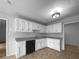 Efficient kitchen with white cabinets and granite countertops, offering style and functionality at 130 Ashley Oaks Dr, Mcdonough, GA 30253