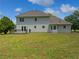 Spacious backyard with a deck, perfect for outdoor entertaining and relaxation at 225 Woodfield Ct, Mcdonough, GA 30253