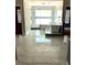 Bright and airy bathroom with a soaking tub, glass shower, and modern tile flooring at 168 Harmony Grove Rd, Lilburn, GA 30047