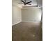 Bedroom with neutral walls, carpet floors, ceiling fan, and natural light at 168 Harmony Grove Rd, Lilburn, GA 30047