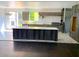 Spacious kitchen featuring a large island, stainless steel appliances, and custom cabinetry at 168 Harmony Grove Rd, Lilburn, GA 30047