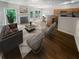 Bright living room with hardwood floors, a fireplace and an open floor plan at 2708 Parkway Trl, Lithonia, GA 30058