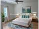 Bright bedroom features a cozy bed, stylish decor, and ample natural light at 2559 Oakbourne Ln, Smyrna, GA 30080