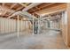 Unfinished basement with exposed utilities and wood framing, offering potential for storage or customization at 3159 Nursery Se Rd, Smyrna, GA 30082