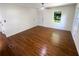 Bedroom featuring hardwood floors, fresh paint, and great natural light at 3159 Nursery Se Rd, Smyrna, GA 30082