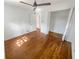 Bedroom with hardwood floors and an open closet area at 3159 Nursery Se Rd, Smyrna, GA 30082