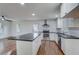 Updated kitchen with white cabinets, stainless steel appliances, granite countertops, and center island at 3159 Nursery Se Rd, Smyrna, GA 30082