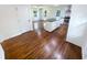 Modern kitchen with stainless steel appliances, island, and hardwood flooring at 3159 Nursery Se Rd, Smyrna, GA 30082