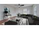 Modern living room with stylish decor, including a comfortable sectional sofa and contemporary artwork at 3159 Nursery Se Rd, Smyrna, GA 30082