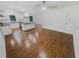 Spacious living room with hardwood floors, lots of natural light, and kitchen access at 3159 Nursery Se Rd, Smyrna, GA 30082