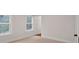 Bright bedroom with hardwood floors, a closet, windows and a door at 522 Pierce Nw Ave, Atlanta, GA 30318