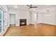 Cozy living room features a fireplace, wood floors, and natural light at 522 Pierce Nw Ave, Atlanta, GA 30318