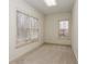 Well-lit office space with large windows and neutral carpet at 5055 Hickory Hills Dr, Woodstock, GA 30188