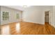 Spacious bedroom with hardwood floors, natural light, and large closet at 1655 Arrowhead Ne Trl, Atlanta, GA 30345