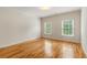 Sunny bedroom with hardwood floors and windows offering natural light at 1655 Arrowhead Ne Trl, Atlanta, GA 30345