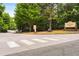 Community sign for Mason Mill Park, located at the corner of a crosswalk at 1655 Arrowhead Ne Trl, Atlanta, GA 30345