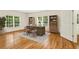 Office featuring hardwood floors, natural light, built-in bookshelves, and an elegant desk at 1655 Arrowhead Ne Trl, Atlanta, GA 30345
