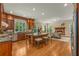 Spacious kitchen with granite countertops, a large island, custom wood cabinets, and stainless steel appliances at 1655 Arrowhead Ne Trl, Atlanta, GA 30345