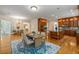 Bright eat-in kitchen featuring hardwood floors, custom cabinets, an island, and stainless steel appliances at 1655 Arrowhead Ne Trl, Atlanta, GA 30345
