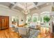 Elegant living room features coffered ceilings and arched windows at 1655 Arrowhead Ne Trl, Atlanta, GA 30345